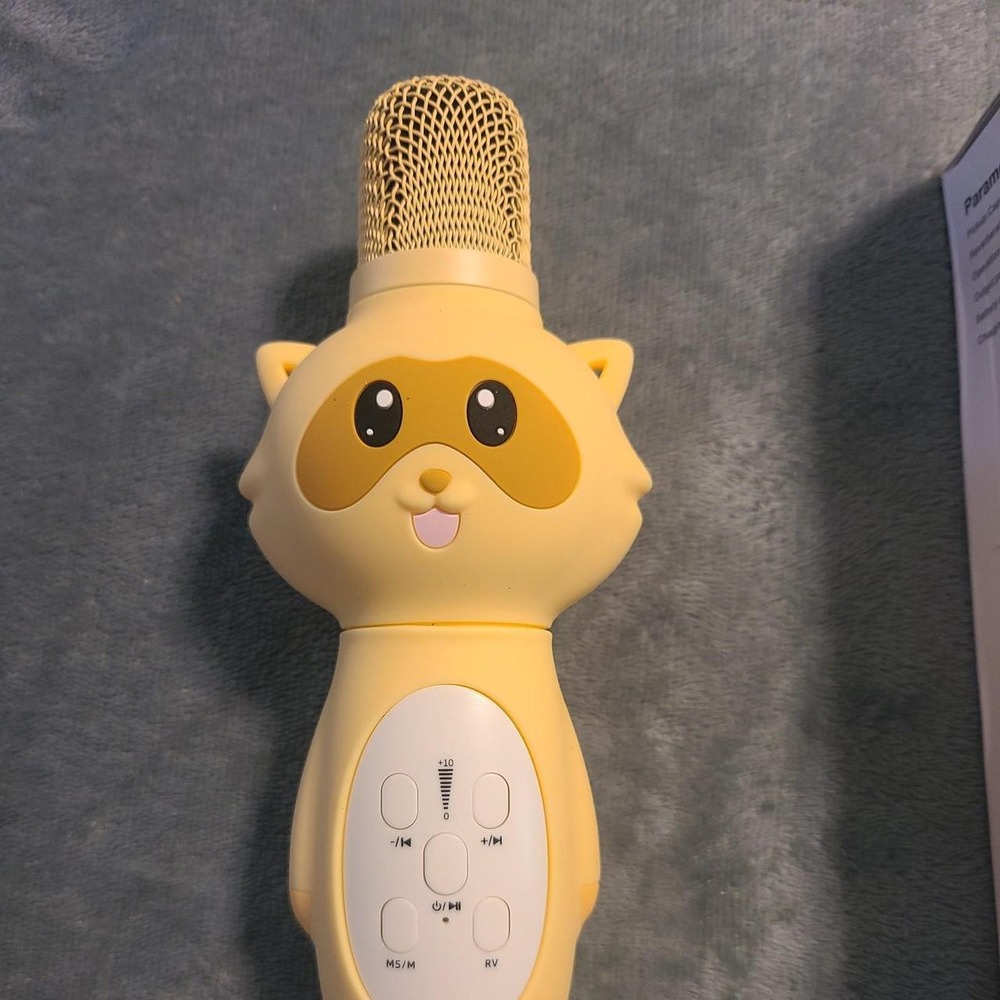Yellow animal-shaped microphone with cute face design